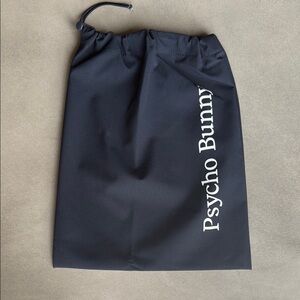 Psycho Bunny Black Logo Pouch and three keychains